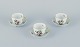 Herend, Hungary. Three porcelain coffee cups with saucers hand-painted with 
butterflies and birds on branches. Gold rim.