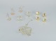 Royal Copenhagen "Royal Christmas". Set of ten brass Christmas ornaments for hanging on the Christmas tree and in the window.