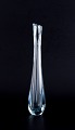 Nils Landberg for Orrefors, Sweden. Tall and slender art glass vase in clear 
glass.