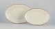 KPM, Poland. Two large oval porcelain serving platters.
Cream-colored with gold rim decoration.