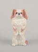 Royal 
Copenhagen, 
porcelain 
figurine of a 
standing ...
