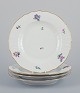 Royal Copenhagen Saxon Flower. Four dinner plates in porcelain. Hand-painted 
with polychrome flowers.