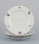 Royal Copenhagen Saxon Flower. Three dinner plates in porcelain. Hand-painted 
with polychrome flowers.