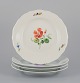 Meissen, Tyskland.
A set of four dinner plates. Hand-painted with different floral motifs.