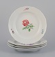 Meissen, Tyskland.
A set of four dinner plates. Hand-painted with different floral motifs.