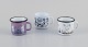 Muurla, Finland. 
Three enamel mugs with different motifs from the Moomin troll universe.