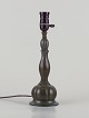 Just Andersen (1884-1943). Table lamp of patinated diskometal.