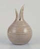 European studio ceramicist. Round vase with a two-part neck.