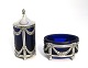 Salt and pepper 
set. Blue glass 
with silver 
mounting (925)