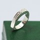 A diamond ring in 14k white gold