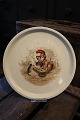 Royal Copenhagen plate / dish in a Christmas dinner set with a Christmas motif 
of an elf and a cat...