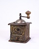 Antique Coffee Grinder - Metal & Dark Wood - Decorated With Pattern - From the 
1890s
Great condition
