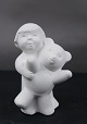 Stone Art white figurine from Marbell, Belgium. 
Child with teddy bear