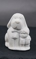 Stone Art slightly sandy colored figurine from Marbell, Belgium. 2 Friends or Dog look after baby.