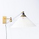 Roxy Klassik 
presents: 
Orla & 
Peter Hvidt & 
Mølgaard / Le 
Klint
Rare wall lamp 
in brass with 
pleated ...