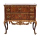 Padouk veneered and partly gilt marble top commode made by the manufacture 
Köster, Altona, Northgermany, circa 1770. Signed. H: 78cm. Top: 85x44cm