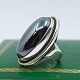 Antik 
Damgaard-
Lauritsen 
presents: 

Regitze 
Overgaard for 
Georg Jensen; 
Big silver ring 
wit hematite 
#46E