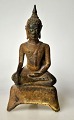 Oriental seated 
bronze Buddha 
figure, 
17th/18th 
century.