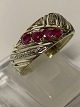 Antik Huset 
presents: 
Ladies' 
ring 8 carat 
gold, with red 
rubies and 
inlaid 
diamonds, size: 
61