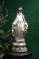 K&Co. presents: 
Large 
Madonna 
figurine in 
mercury glass 
from the 19th 
century 
with remnants 
of old paint. 
H: ...