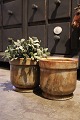 Old flower pots in marble in nice colors. H: 17cm.