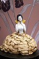 Decorative, old French half doll in porcelain with sewn-on pincushion under the 
fine fabric dress...