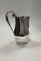 Danam Antik 
presents: 
Giant 
Georg Jensen 
Sterling Silver 
Cosmos Water 
Pitcher No. 45 
B