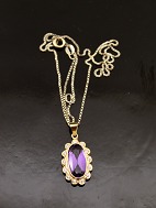 14 carat gold pendant with amethyst