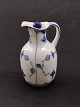 Middelfart 
Antik presents: 
Royal 
Copenhagen blue 
fluted oil jug 
1/1179