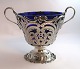 Michelsen. 
Silver bowl 
with blue glass 
insert (830). 
...