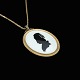 Bestik.dk 
presents: 
Royal 
Copenhagen. 
Porcelain and 
Gilded Sterling 
Silver Pendant 
- Juliane 
Marie.
