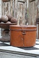 Old oval metal box with old original paint and fine patina.