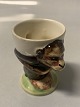 Egg cup Faience.
Motif: Monkey.