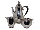 Georg Jensen silver
Rare coffeepot, creamer and sugar bowl with grapes from 1933-1944