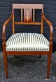 Pegasus – Kunst 
- Antik - 
Design 
presents: 
Danish 
empire style 
armchair in 
mahogany with 
intarsia. 
approx. 1920