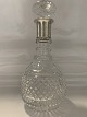 Crystal carafe with silver base.
Height.: 27 cm.
