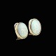 Bestik.dk presents: 14k Gold Ear Clips with Cabochon Opal.