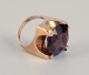 Thomas Skat-Rørdam, modernist cocktail ring in 14 karat gold.
Adorned with smoky quartz.