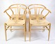 Set of Four 
Wishbone Chairs 
- Model CH24 - 
Beech & Paper 
...