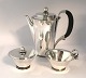 Lundin Antique 
presents: 

Georg 
Jensen. 
Pyramid. 
Sterling silver 
coffee pot 
(925). Model 
600A. 
Consisting of 
...