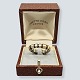 Antik 
Damgaard-
Lauritsen 
presents: 

Anette 
Kræn; A Danish 
design ring in 
silver with 
gold