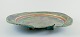 Édouard Massier (1856–1920), French ceramicist.Colossal unique dish of glazed ceramic, on three feet.