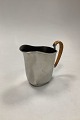 Just Andersen 
Jug with wicker 
in Cast Pewter, 
No. 2500