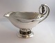 Lundin Antique 
presents: 
Georg 
Jensen. 
Sterling (925). 
Sauce bowl with 
grapes. Design 
296A. Length 24 
cm. ...