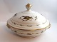 Lundin Antique 
presents: 
Royal 
Copenhagen. 
Round lidded 
dish with bird 
motif. Diameter 
23 cm. Height 
15 cm. ...