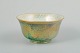 L'Art presents: 
Daisy 
Makeig-Jones 
for Wedgwood, 
England.
Bowl in 
“Lustre Ware” 
with green 
glaze.