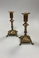 Danam Antik 
presents: 
Antique 
pair of tall 
Candlesticks in 
Brass