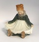 Lundin Antique 
presents: 
Royal 
Copenhagen. 
Sitting Fanö 
girl. Model 
1315. Height 14 
cm. (2 quality)