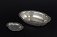 Just Andersen
Oval and round 
bowls in 
pewter, both 
with ...