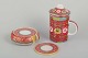 Chinese 
porcelain
Tea set with 
mug and tea 
strainer and 
...